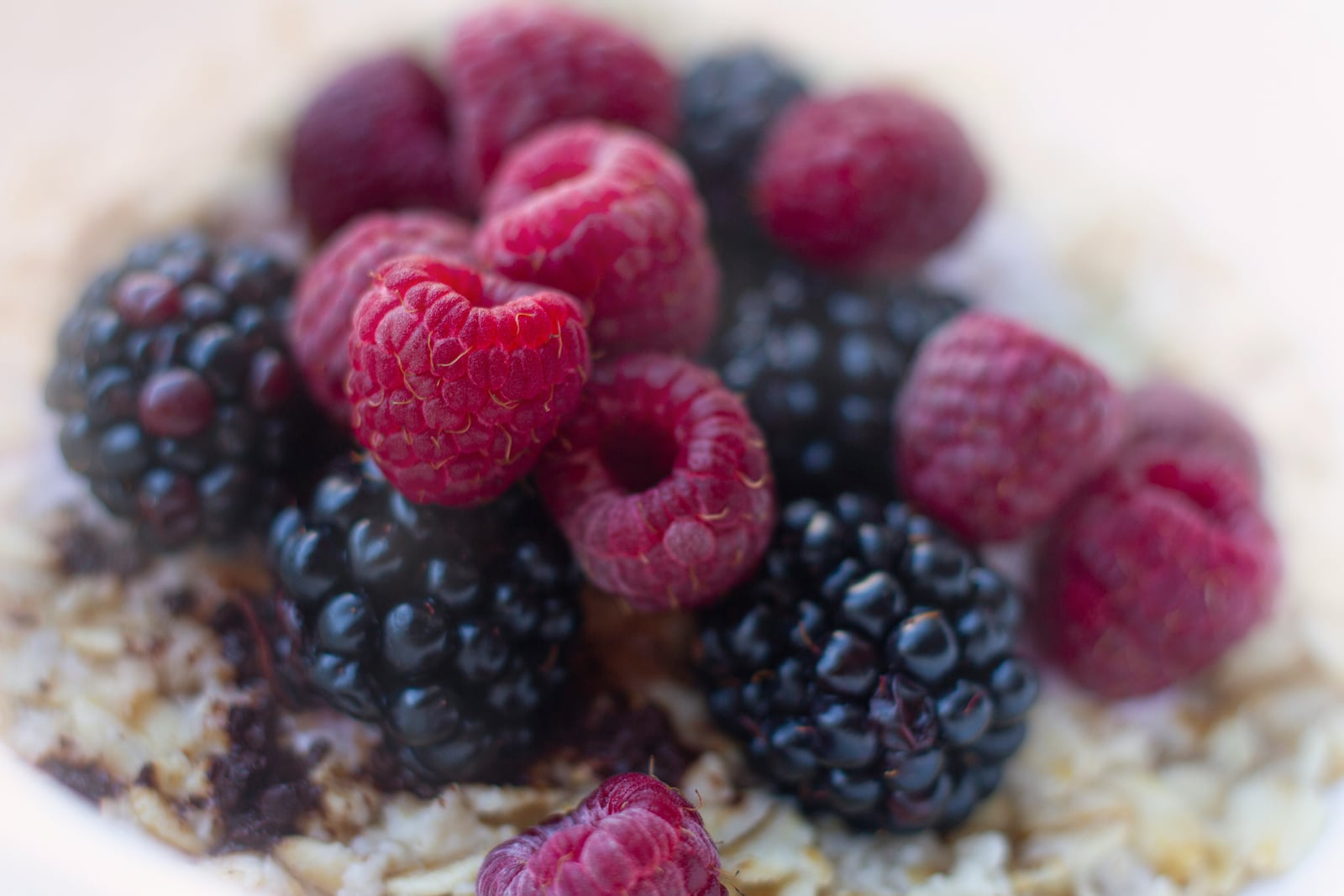 Warm oats with soy milk, berries and chia